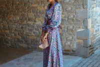 07 a bright floral print maxi derss with puff sleeves, a blush bag and dark green wedding shoes plus dark green earrings