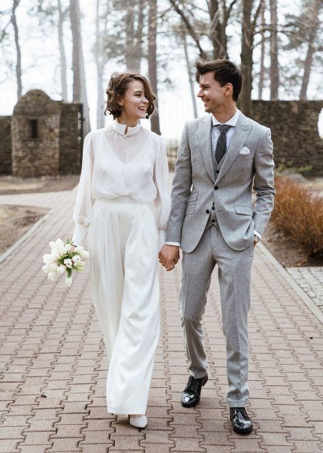 a refined bridal look with pleated palazzo pants, a top and a semi sheer shirt with a high neckline over the top plus white shoes