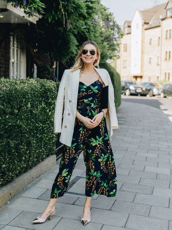 a moody botanical print jumpsuit with culottes, trendy slingbacks and a black clutch plus a neutral blazer