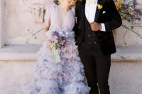 24 a delicate and sophisticated lavender wedding dress with a tulle bodice and a ruffle skirt just wows with its unusual color