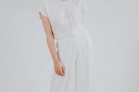 27 a modern and cute bridal look with a white sequin crop top with cap sleeves and white plain wideleg pants is chic