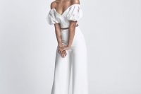 28 a pretty and playful bridal look with an off the shoulder crop top with puff sleeves, high waisted palazzo pants and cool earrings