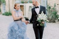 30 a jaw-dropping blue wedding dress with a halter neckline, a ruffle skirt and a black ribbon belt – all these are hot trends of 2022