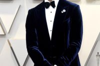 05 a chic look with black torusers, a black velvet bow tie, a white shirt with black buttons and an elegant navy velvet dinner jacket