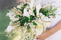 08 a lily of the vally wedding bouquet with greenery and calla lilies is a beautiful and creative idea of a spring wedding bouquet
