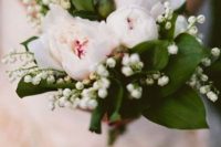 13 a spring wedding bouquet of blush peonies and foliage plus lily of the valley is a very catchy and chic idea for a bride