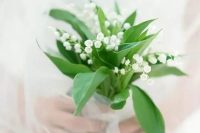 15 a tiny and gorgeous lily of the valley wedding bouquet with leaves is a fantastic idea for a spring bride, it looks and feels airy
