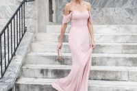 25 a delicate blush off the shoulder maxi dress and a neutral printed clutch for a very girlish look at the wedding