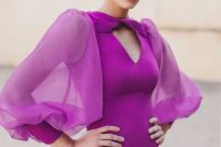 33 a hot pink fitting midi dress with a cutout neckline and semi sheer puff sleeves, statement earrings for a black tie wedding