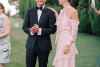 51 an out of the box solution for a black tie wedding – a blush maxi dress with ruffles, open shoulders and a bow, long sleeves and a polka dot print