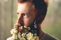 a beard with large and small white blooms contrasts the color of the beard and adds a fresh touch to the look
