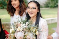 a catchy black and clear eyeglass frame is a lovely idea for a modern bride, it will accent your face but no too much