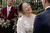 a lovely bride in a statement earrings