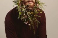 a refined woodland and wildflower beard with lots of greenery, pink and white blooms, thistles and various foliage