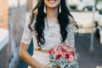 a trendy bridal look with a separate – a lace off the shoulder top and a plain skirt, statement earrings and glasses in a clear frame