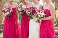 04 lovely strapless A-line hot pink bridesmaid maxi dresses with draped bodices and pleated skirts are great for a lovely bold wedding