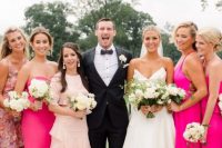 05 bridesmaids wearing light pink, hot pink and dusty pink mismatching maxi dresses look fantastic and trendy