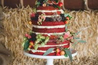 06 a delicious naked red velvet wedding cake decorated with pink blooms, greenery, mini apples and blackberries is amazing for a summer or fall wedding