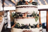 06 a gorgeous fall naked wedidng cake decorated with blackberries, blueberries, figs and greenery looks very yummy