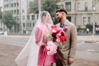 12 a printed hot pink blazer wedding dress, a veil and white platform shoes for a fashion-forward bridal look