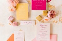 15 a bold and cool wedding invitation suite with a pink and orange envelope, a hot pink and yellow invitation plus pink calligraphy