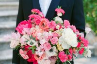 16 a bold and elegant wedding bouquet with white, light and hot pink blooms, orange flowers and greenery is a fantastic idea to add color to the bridal look