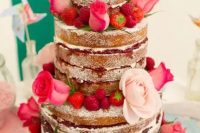 17 a naked wedding cake decorated with pink and blush roses, strawberries and raspberries is amazing for Valentine weddings