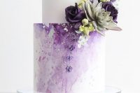 19 a pretty and delicate wedding cake with a white and watercolor purple tier, with dark purple and lilac blooms and a succulent is wow