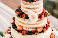23 a naked wedding cake with fresh berries and blush blooms is a nice option for a summer rustic wedding