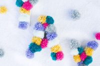 28 make colorful pompom monograms to decorate your wedding venue and add color and interest to it