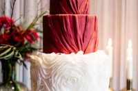29 a sophisticated red wedding cake with textural pleated tiers and a white floral tier, with red blooms on top is a very chic idea