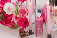 a bold wedding tablescape with lots of pink