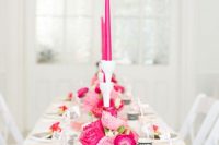 36 a pretty modern wedding tablescape done in black and white, with light and hot pink blooms, hot pink candles, pink punch and printed porcelain is a lovely idea