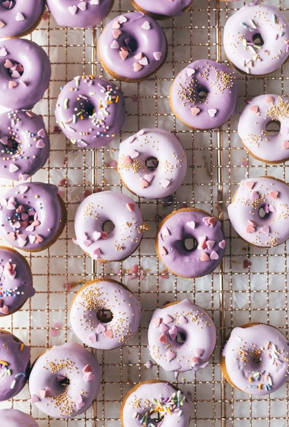 gorgeous baked buttermilk frosted mini donuts topped with sugar hearts and confetti are amazing for a purple wedding