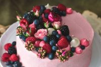 40 a delicate pink wedding cake with pink blooms, fresh berries and white and pink meringues is a gorgeous idea for a summer wedding