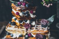 55 a gorgeous summer boho waffle wedding cake with blueberries and blackberries plus purple blooms and some caramel