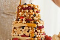 62 a waffle wedding cake with blueberries, strawberries and caramel on top is delicious and tasty
