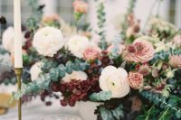 a lush and textural wedding bouquet of greenery, pink and white blooms, burgundy bouquet fillers is a gorgeous idea for the fall