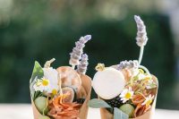 grazing cups with grapes, cookies, cheese, blooms, herbs and figs, blackberries and salami are cool for a summer wedding