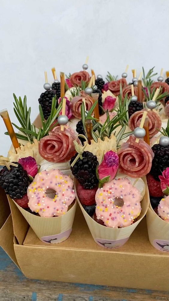 wedding charcuterie cones with cookies, blackberries, edible blooms, herbs, sugar beads are perfect for your wedding food station