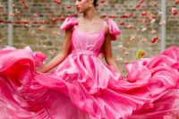 a bold pink wedding dress