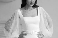 18 a lovely and chic modern plain wedding dress with a square neckline, sheer bell sleeves, a matching white belt