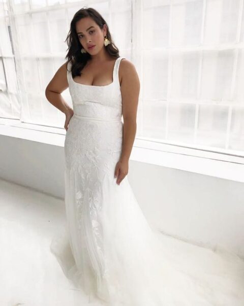 Alexandra Grecco’s Marcelle wedding dress features a soft square neckline, straps and a fitted skirt that flares at the bottom