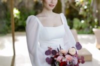a romantic wedding dress with a square neckline, puff sleeves and a pleated skirt is a beautiful idea to go for