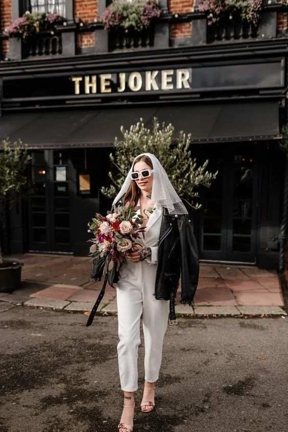 a leather jacket is a great bridal cover up