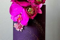 a cute dark purple wedding cake