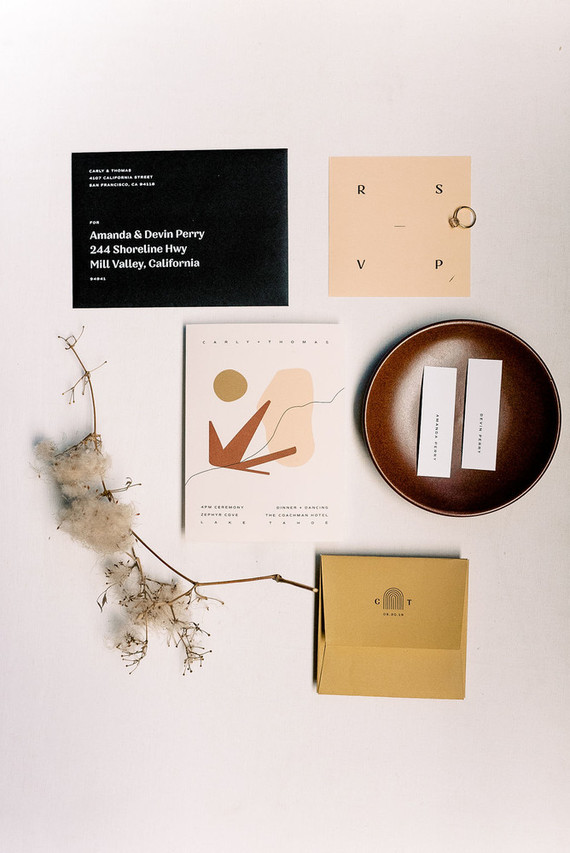 a bold and catchy yet minimal fall wedding invitation suite with abstract prints and catchy letters is amazing