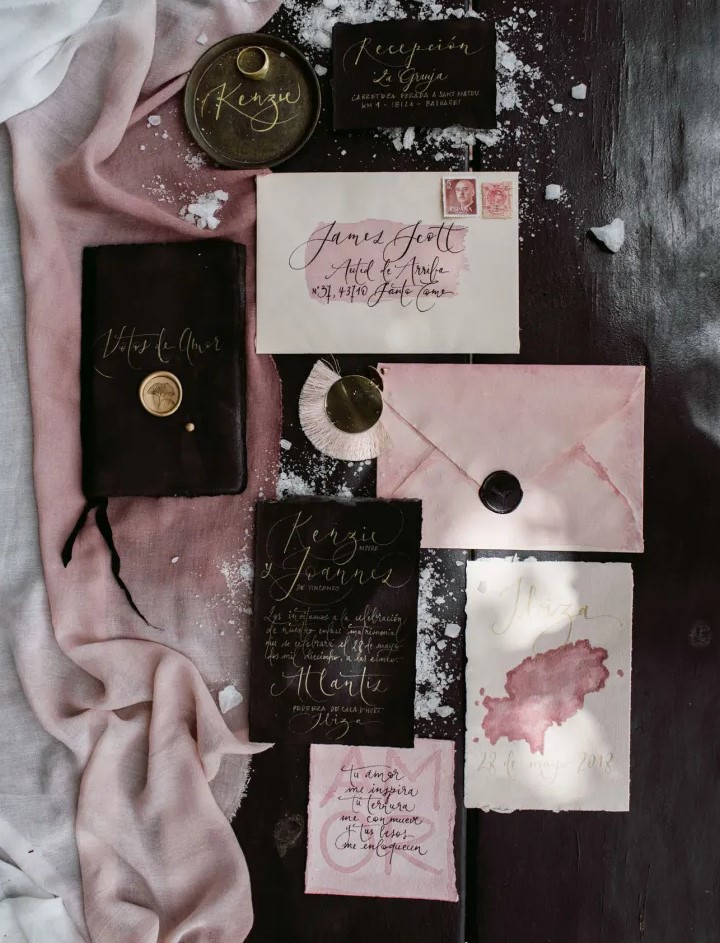 a fantastic pink, blush and black invitation suit with calligraphy for a glam rock wedding