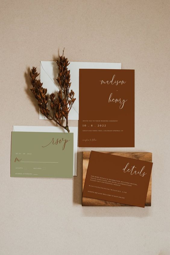 a bold minimalist wedding invitation suite with burgundy and green parts and a bit of calligraphy is a chic idea
