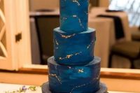 15 a navy and midnight blue wedding cake with gold stars inspired by the Starry Night by Van Gogh is amazing for a wedding